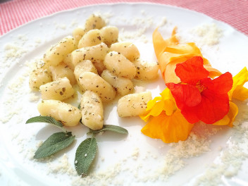 Homemade potato gnocchi with butter and sage